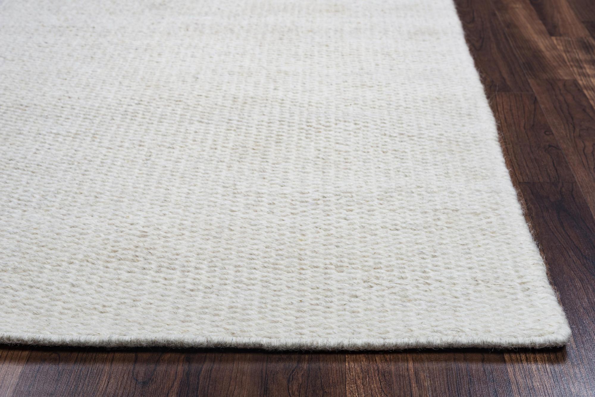 Off White And Ivory Wool Hand Woven Area Rug