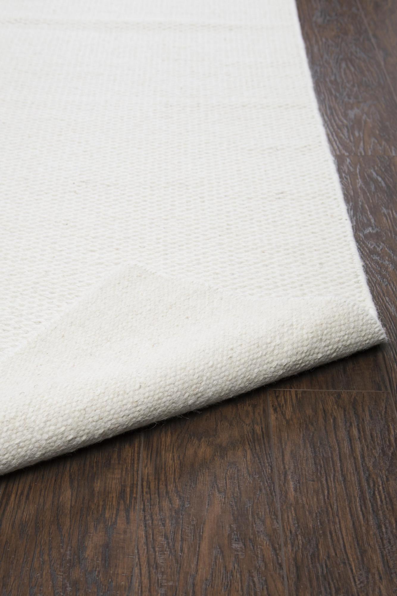 Off White And Ivory Wool Hand Woven Area Rug