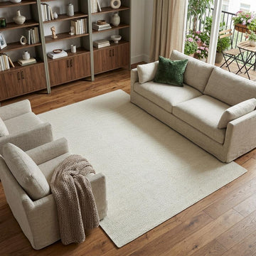 Off White And Ivory Wool Hand Woven Area Rug